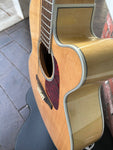 Profile shot of soundhole from a top down angle 