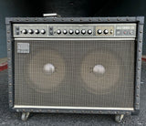 Roland Jazz Chorus, Grey panel with knobs, Roland Logo, two speakers with wheels