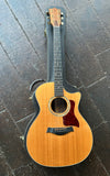 1996 Taylor Custom
Employee Custom Built, spruce top, rosewood neck and fretboard with rosewood neck