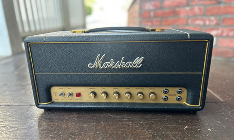 Marshall amplifier head black tolex, gold control panel amd six button control knobs 