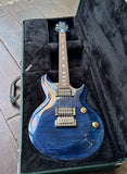 Terry C. McInturff Glory blue finish , maple top, with rosewood fret board with abalone inlays