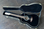 Takamine EF381SC 12-String black finish twelve string acoustic guitar with rosewood fretboard and black headstock 
