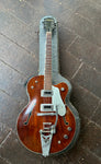 1962 Gretsch Chet Atkins Tennessean archtop guitar, mahogany finish, with bigsby and two black pickups, with rosewood fretboard and black headstock