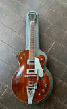 1962 Gretsch Chet Atkins Tennessean archtop guitar, mahogany finish, with bigsby and two black pickups, with rosewood fretboard and black headstock