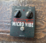 Forest green, Voodoo Lab Micro Vibe guitar effects pedal, with two knob controls and single button foot switch