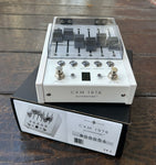 White pedal, two metal button with effect option, five grey fader slider switches, on box, model  listed CXM1978