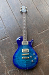 Lake Blue PRS electric Guitar with two chrome pick ups, four clear knobs, chrome bridge and tunematic, with rosewood fretboard with bird inlays, blue headstock