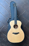 Top View Furch Acoustic Guitar on top of black case, spruce top, rosewood bridge, rosewood fretboard with dot inlays, black headstock, Furch logo