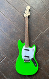 top view lime green mustang with white pick guard, two black single coil pick ups, rosewood fretboard, dot inlays, fender headstock with Squier script 