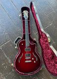 2014 Taylor T3 hollow-body - Red Edgeburst electric guitar in red case on wood surface