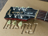 Closeup of headstock for 2015 Gibson Les Paul 100 Studio