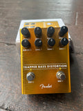 Fender Trapper Bass Distortion propped up against included box