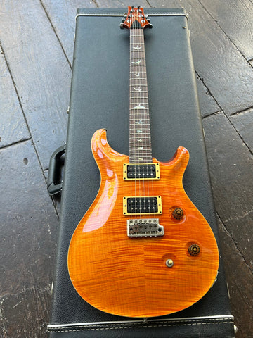 2002 PRS Custom 24 Amber top black pick pick-ups, rosewood neck, bird inlays with brown headstock