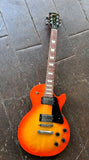 Full shot of 2022 Gibson Les Paul Studio Tangerine Burst