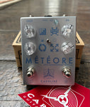 Carolina Guitar Co. Météore Lo-fi Reverb 10th Anniversary Special silver guitar effects pedal with four control knobs and two button foot switch