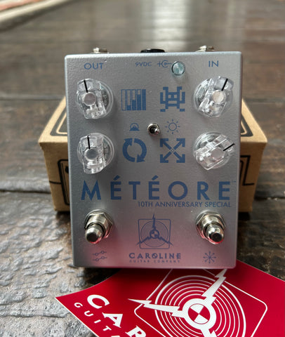 Carolina Guitar Co. Météore Lo-fi Reverb 10th Anniversary Special silver guitar effects pedal with four control knobs and two button foot switch