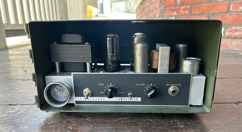 Custom Filmosound Amp, in green metal case with metal housing, three guitar tubes, black control panel two knobs and projector lens