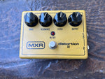MXR Distortion II (79-84) effects pedal in yellow enclosure, four black knob controls and single button footswitch