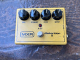 MXR Distortion II (79-84) effects pedal in yellow enclosure, four black knob controls and single button footswitch