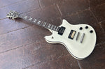 White Shecter tempest electric guitar with rosewood neck, pearl inlays and black headstock