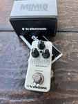 Light grey TC Electronic Mimiq Mini Doubler Pedal, with three black knob controls and single button footswitch