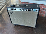 1976 Fender Twin Reverb guitar amplifier, black tolex, grey grill cloth, metal control panel with twelve black nob controls