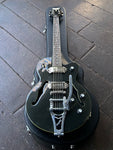 Epiphone Wildkat arch-top guitar in black sparkle finish and chrome hardware with rosewood fretboard and black headstock. Chrome P-90 pick-ups