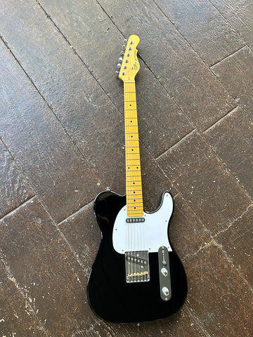 G&L Tribute Series ASAT Classic black telecaster with white pickguard and pale neck and headstock