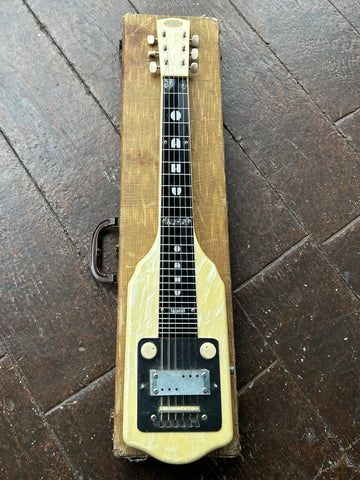 Oahu Lap Steel Supreme Oahu Supreme Mid 1950’s  Cream mother of pearl, black plastic fretboard and moth of pear headstock