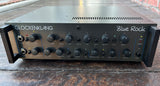 front view Glockenlan Blue Rock amplifier head with thirteen knobs, two inputs