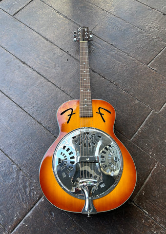 Top view sunburst Fender dobro, metal cover plate, F shaped sound holes. rosewood fretboard with dot markers, brown headstock, Fender 