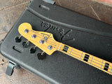 Close up fender maple neck with block inlays. Fender script logo with metal clover tuners