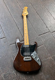 Music Man Sabre 1 Walnut finish electric guitar, with maple neck and headstock
