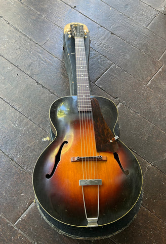 1950's Gibson L-50 sunburst arch-top, with rosewood bridge and fretboard, black headstock