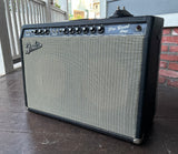 1965 Fender Pro Reverb guitar amplifier, black tolex, grey grill cloth and black control panel with knobs