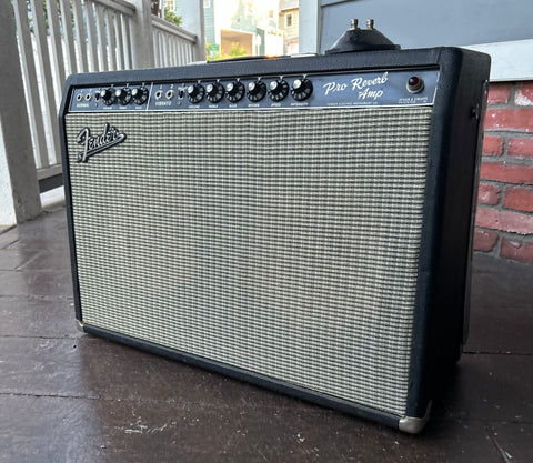 1965 Fender Pro Reverb guitar amplifier, black tolex, grey grill cloth and black control panel with knobs
