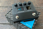 Closeup of Echo FX Spring Reverb EF-P2 on top of included box