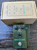 Universal Audio Brigade Chorus & Vibrato green guitar effects pedal , with three control knobs, single button footswitch