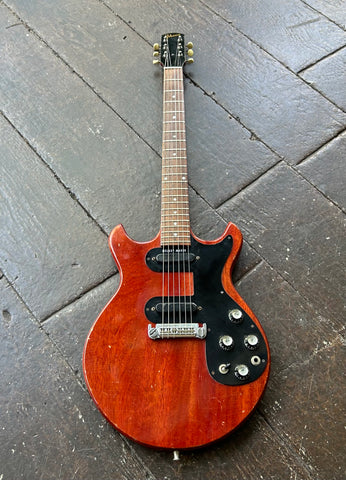 1965 Gibson Melody Maker cherry finish , black pickguard, rosewood pickups and black headstock