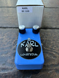 Blue KARL Loverpedal guitar effects pedal on a wooden surface