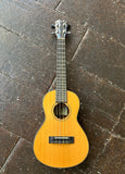 Pono ukulele with cedar top. Ebony bridge and headstock