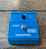 Blue guitar effects pedal with 'Rocktron' branding on a wooden surface