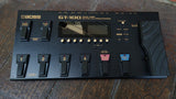 Black GT-100 effects pedal with eight foot controls for guitar